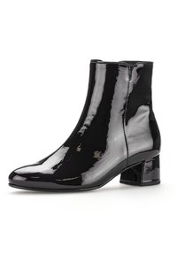 Schwarze Lackleder-Stiefelette mit runder Zehenform und mittelhohem Blockabsatz, ausgestattet mit einer glatten, glänzenden Textur und einfachen Nähten.