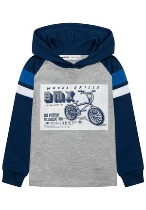 Sweat-shirt à capuche avec un corps gris, des manches bleu marine et des accents bleus. Le graphique central affiche un vélo avec du texte sur un fond blanc.