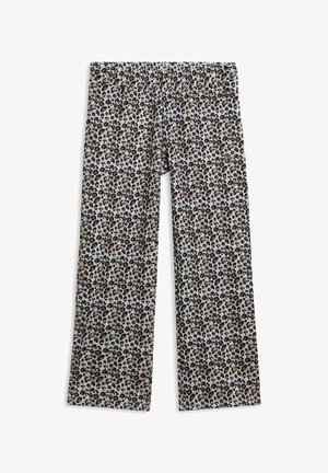 Pantaloni con stampa animalier leopardata e vita elastica, realizzati in tessuto morbido; presentano macchie marroni, nere e beige su uno sfondo chiaro.