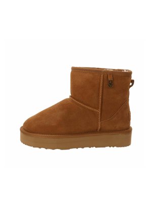 Bottine en daim marron clair avec un bout arrondi, doublure en shearling et une languette à l'arrière. Dispose d'une semelle en caoutchouc texturée.