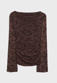 Dugih rukava u tamnosmeđoj tkanini s cvjetnim uzorkom. Ima nabrane detalje sa strane i glatku, meku teksturu.