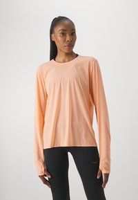 HOKA AIROLITE RUN LONG SLEEVE - Pikkade varrukatega topp - papaya