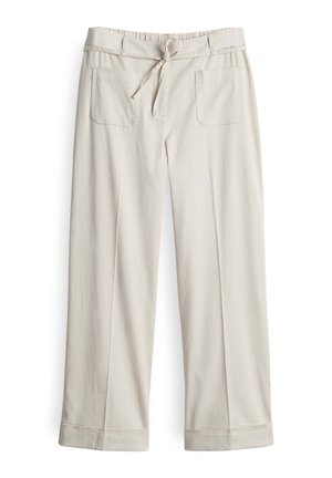 Beige, wide-leg pants made from soft fabric, featuring front tie closure, elastic waistband, and two back pockets with square shapes.