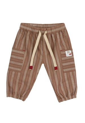 Brązowe spodnie w paski z elastycznym pasem i kremowym sznurkiem. Posiadają dwie boczne kieszenie z czerwonymi akcentami oraz naszywkę z etykietą.