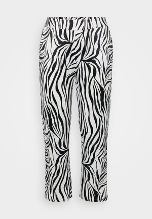 Svarte og hvite stripete bukser med en flytende design, elastisk liv, og lett utvidede ben med en teksturert overflate.