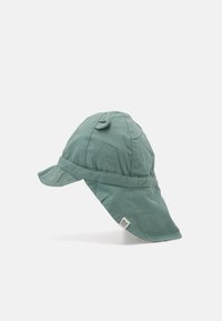Green fabric cap with a wide brim, rounded top, and a small decorative button on top. Features a stitched band and a logo tag on the side.