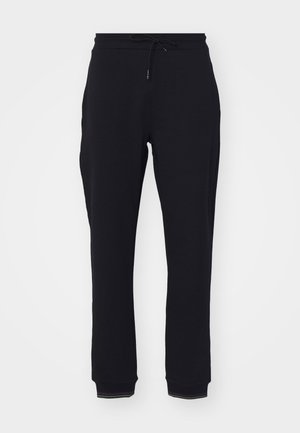 Black sweatpants made from a soft fabric, featuring an elastic waistband with a drawstring and ribbed cuffs at the ankles.
