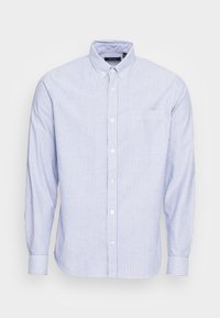 Blå- och vitrandig långärmad skjorta, med knäppt krage, en bröstficka, tillverkad av bomull, med vanlig passform och mjuk textur.