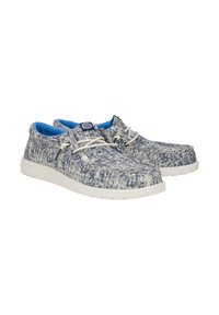Scarpe in tessuto intrecciato blu e bianco con punta rotonda, suola bianca e lacci. L'interno presenta un rivestimento blu brillante.