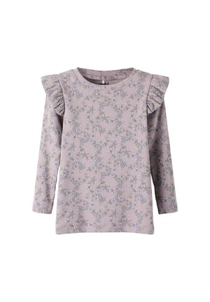 Top met lange mouwen in licht lavendel met bloemmotief. Voorzien van gerimpelde schouderaccenten en een ronde hals. Gemaakt van geribbelde stof.