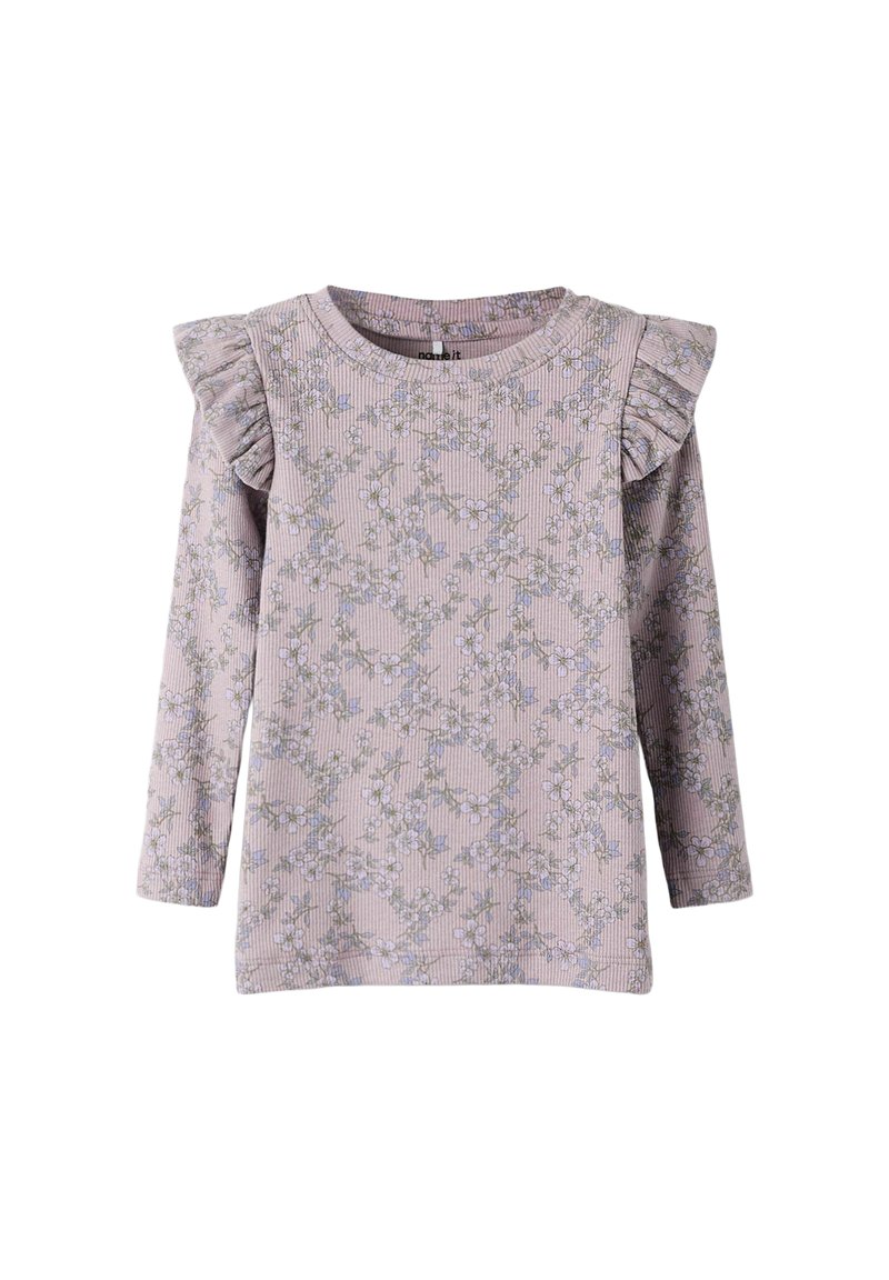 Haut à manches longues en lavande clair avec motif floral. Présente des accents à volants sur les épaules et un col rond. Confectionné en tissu côtelé.