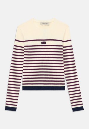 Kremfarget ribbestrikket genser med lange ermer, med maroon horisontale striper, marineblå mansjetter og falde, samt liten brodert logo i midten av brystet.