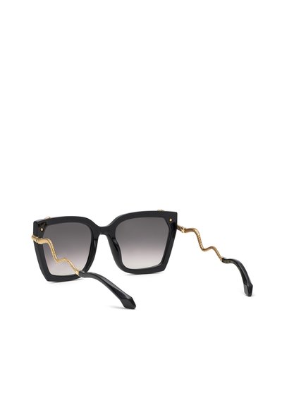 Lunettes de soleil carrées noires avec verres dégradés et branches dorées en forme de serpent à motifs sur fond blanc.