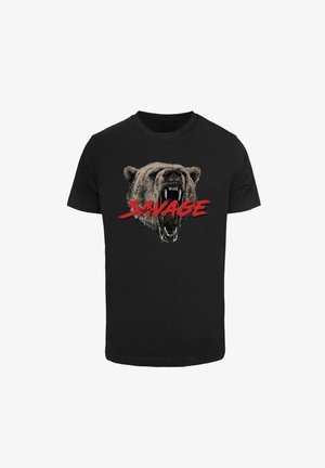 T-shirt noir en coton avec un graphisme d'un ours rugissant et le texte "TRUE SAVAGE" en lettres rouges audacieuses sur le devant.
