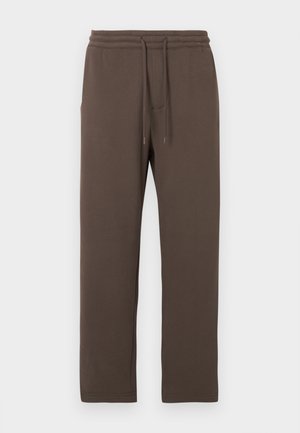 Pantaloni della tuta marroni realizzati in tessuto morbido, con vita elastica e cordoncino, gamba dritta e senza tasche o pattern visibili.