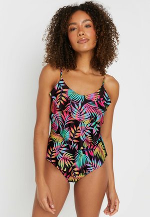 Maillot de bain une pièce noir avec des motifs de feuilles tropicales colorées, des bretelles réglables et un détail en volants sur le devant. Texture lisse.