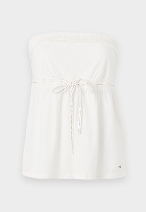 Top bianco senza spalline realizzato in cotone, con scollatura arricciata, vita con cordoncino e sottili dettagli di cucitura rossa.