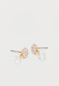 Aranyszínű fülbevalók hatszögletű mintával, kristály díszítéssel és áttetsző, kerek drágakő medállal. Fém hátsó rögzítés.