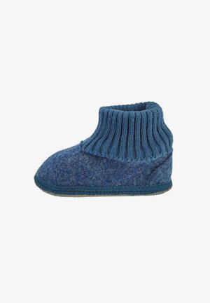 Blue woolen slipper featuring a ribbed cuff, rounded toe, and textured surface. Soft material with a contrasting sole edge.
