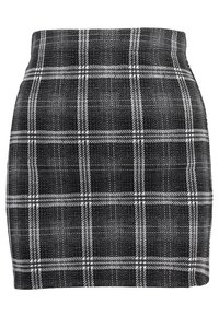 Schwarzer und weißer Karorock, strukturierter Stoff, taillierte Passform mit hoher Taille. Verfügt über ein klassisches Karomuster auf der gesamten Fläche.