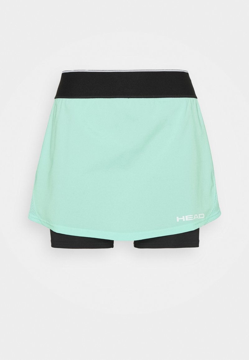 Una falda deportiva de color verde menta con pantalones cortos negros por debajo, que presenta una cinturilla negra y un pequeño logo blanco en la esquina inferior derecha.