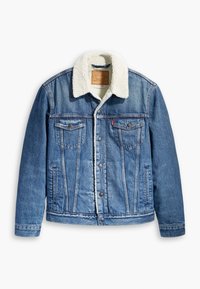 Jeansjacka i ljusblått med en vit imitationsfårskinnskrage, framfickor och silverdetaljer. Har en rak skärning och stickade detaljer.