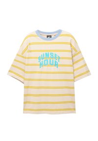 Short-sleeve, cream cotton t-shirt with yellow horizontal stripes and light blue collar. Features "SUNSET HOUR" in bright blue embroidery.
