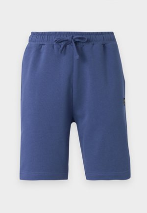 Modré šortky s elastickým pásom na šnúrku, bočnými vreckami a malou logovou záplatou na pravej strane.