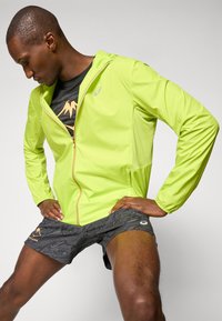 ASICS CORE zielony neon