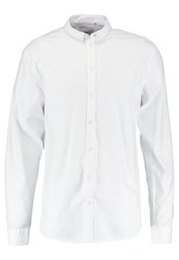 Camicia bianca a maniche lunghe realizzata in cotone, con colletto button-down, patta con bottini frontale e una texture liscia e croccante.