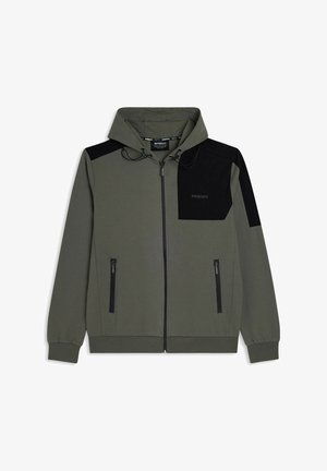 Sweat à capuche zippé vert olive avec un panneau noir sur une épaule, doté de poches zippées à l'avant et d'un cordon de serrage à la capuche. Confectionné en tissu doux.