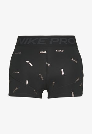 Czarne, kompresyjne spodenki Nike Pro z małymi, odblaskowymi logo "NIKE" na całej powierzchni oraz szerokim pasem z napisem "NIKE PRO" w ciemnym nadruku.