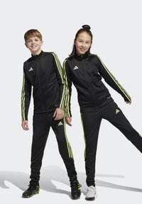 adidas Performance TIRO 23 CLUB TRAINING - Jogginghose - black/pulse lime