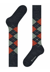 Calze blu scuro con motivo argyle, caratterizzate da diamanti rossi, verdi e neri con cuciture bianche. Realizzate in un materiale morbido e testurizzato.