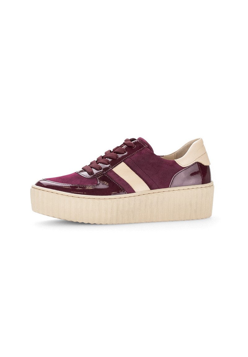 Burgundy platform sneakers with a mix of glossy patent and matte suede textures. Features beige stripes and a ribbed sole.