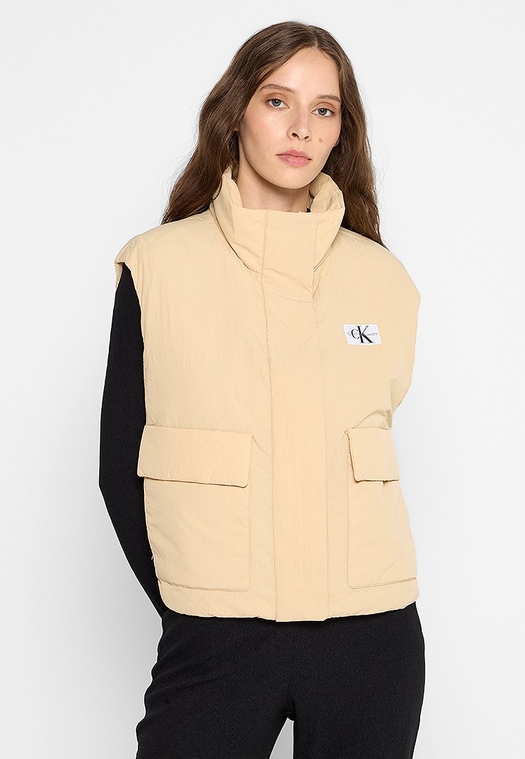 Calvin Klein Jeans Bodywarmer zandkleur Calvin Klein Jeans Bodywarmer zandkleur