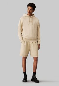 Calvin Klein Jeans Treningo apatinė dalis - pale khaki