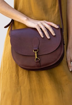WIEBKE - Cross body bag - burgundy
