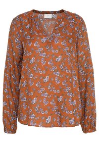 Roestkleurige blouse van lichte stof met een bloemenpatroon in paars en wit. Heeft lange mouwen en een V-hals.