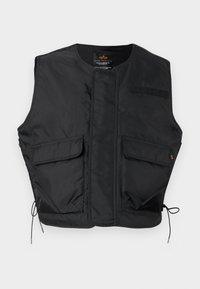 Chaleco utilitario negro sin mangas con dos bolsillos delanteros con solapa, cordones en el dobladillo y escote redondo.
