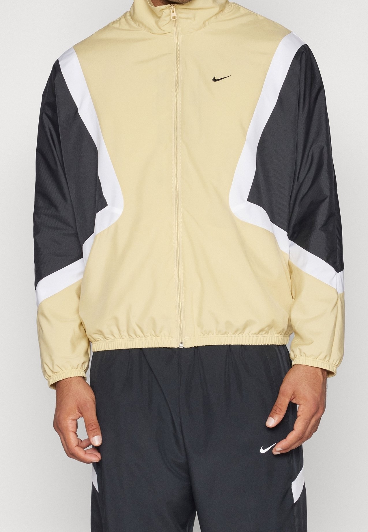 white and gold nike windbreaker mens