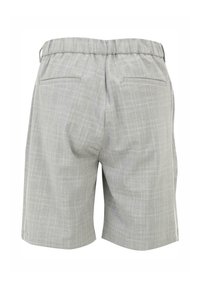 Pantalones cortos de cuadros grises con cintura elástica, dos bolsillos traseros y un corte recto. El material presenta un sutil patrón texturizado.