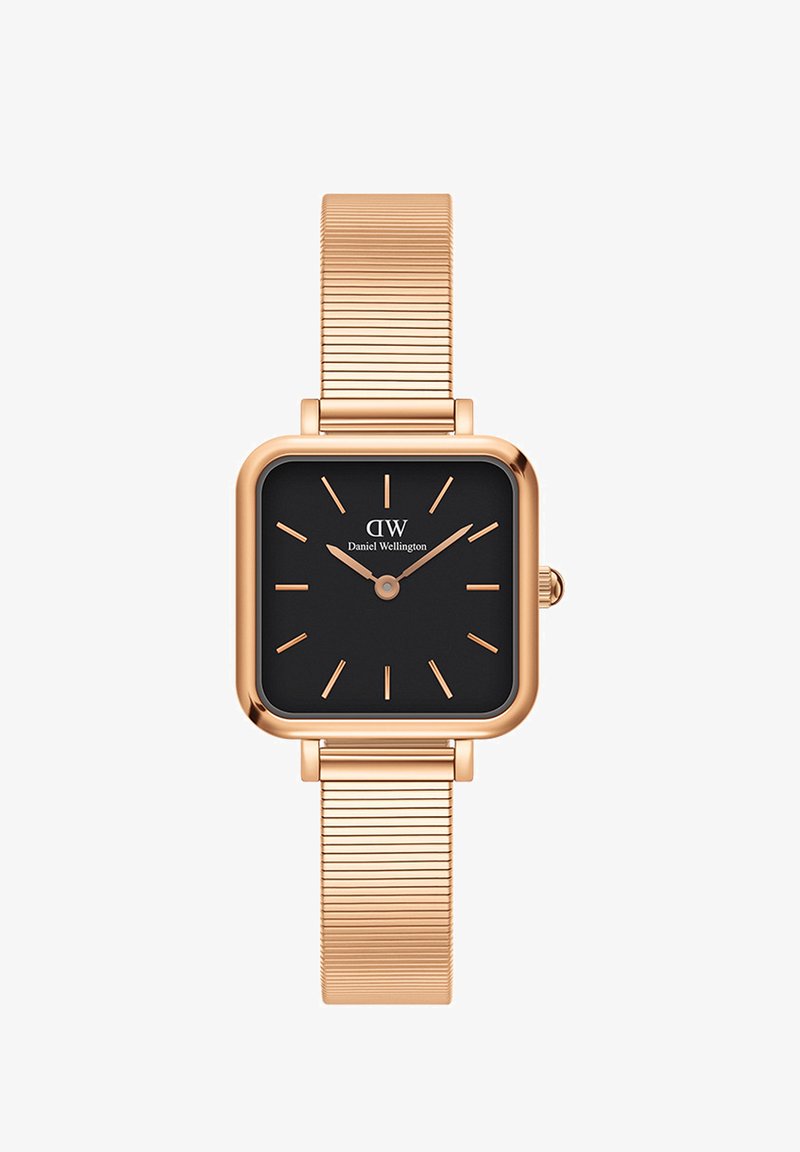 Ruudukujuline Daniel Wellingtoni kell musta kelladial, roosakuldne korpus ja võrgurihm. Minimalistlik disain koos sobivate roosakuldsete käega.
