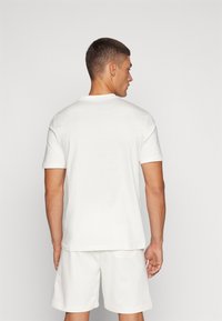 Sergio Tacchini BOLD - Pamata T-krekls - gardenia/navy