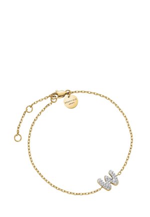 Pulsera de cadena de oro con un colgante en forma de "W" adornado con cristales claros. Cierre seguro y cadena ajustable. Textura suave, diseño elegante.