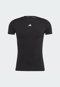 Camiseta atlética corta negra de manga corta, hecha de un tejido suave y elástico. Presenta un logo blanco de Adidas en el pecho y un escote redondeado.