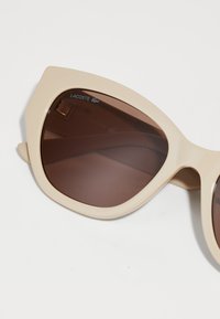 Lacoste Akiniai nuo saulės - sand
