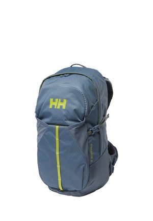 Blauwe outdoor rugzak met gele accenten, voorvak met ritssluiting, compressieriemen aan de zijkant en gevoerde rugondersteuning, gelabeld "Generator 20".