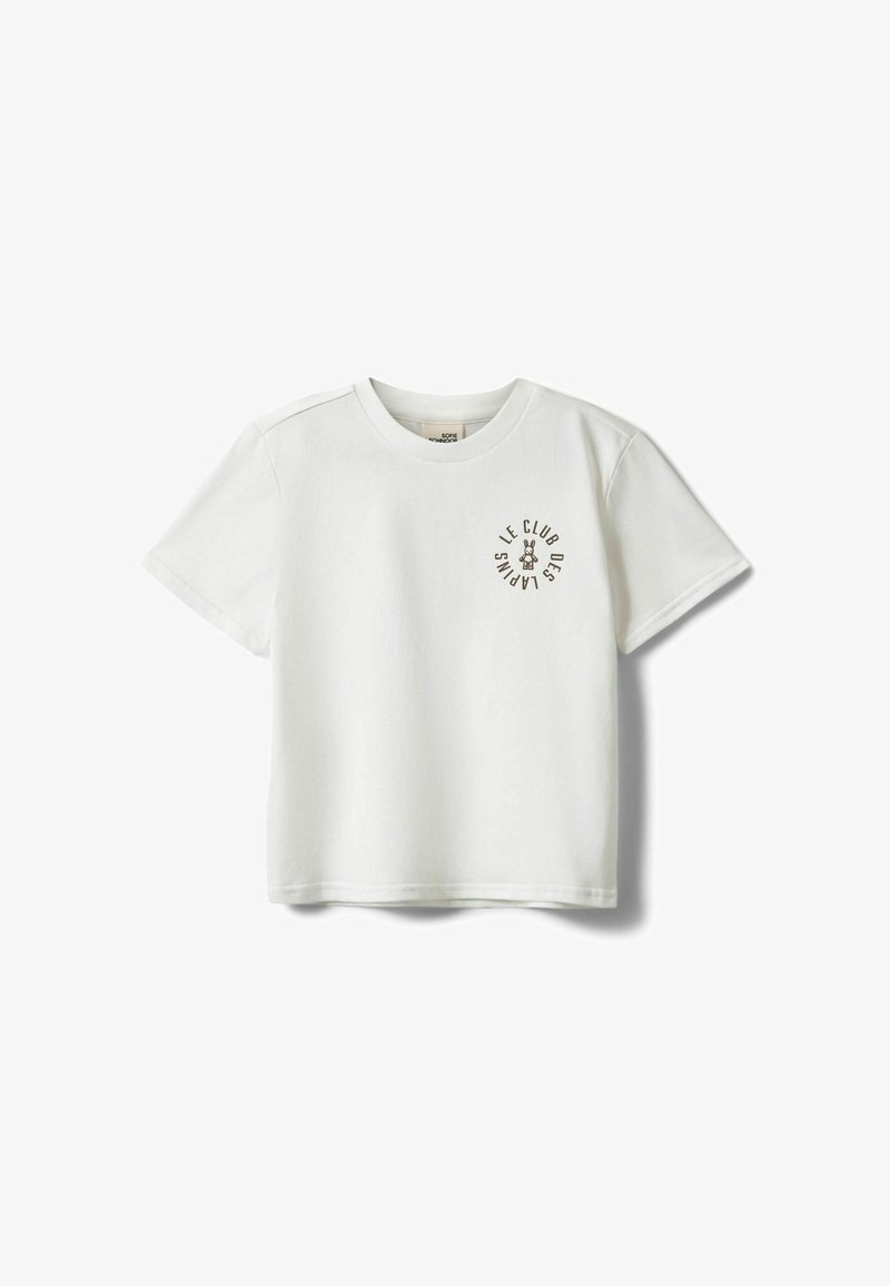 T-shirt blanc à manches courtes avec col rond et petit logo circulaire sur le côté gauche de la poitrine avec le texte "Le Club des Lapins" et une illustration de lapin.