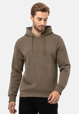 Olivgrüner Kapuzenpullover mit einer Fronttasche und Kordelzügen. Hergestellt aus glattem, strukturiertem Stoff mit gerippten Bündchen.